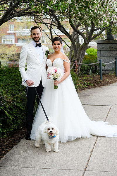 Wedding couple with small dog