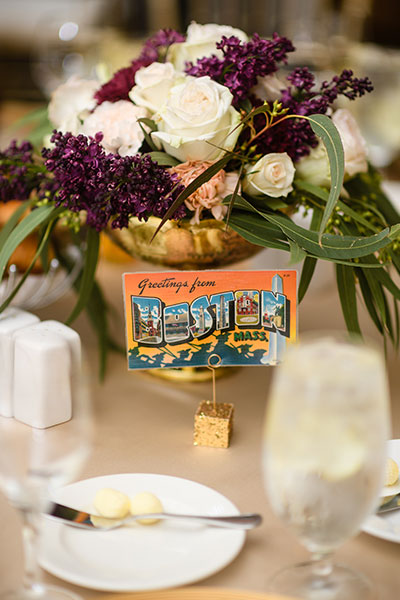 Wedding table setting with postcard