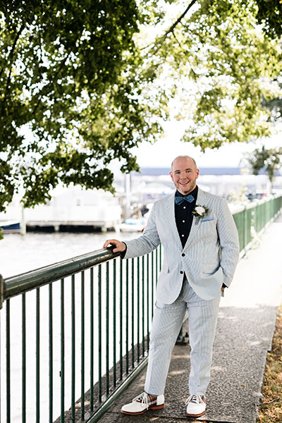Groom by waterfront
