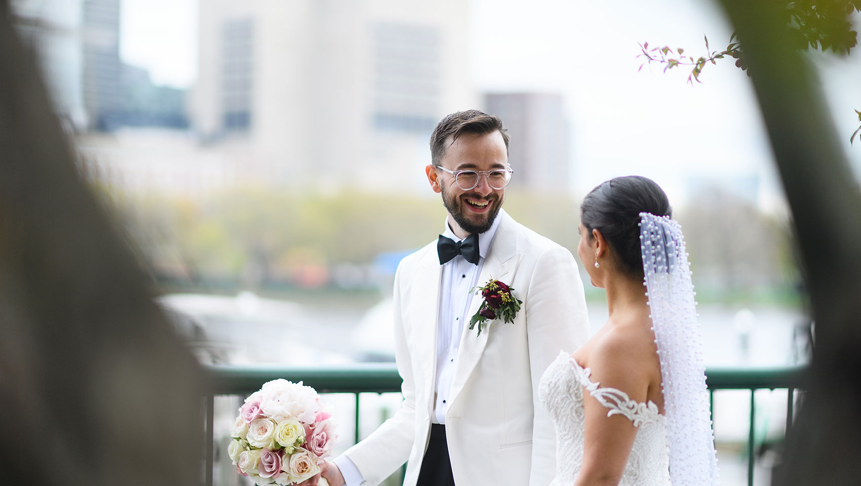 Bride and groom looking at each other 