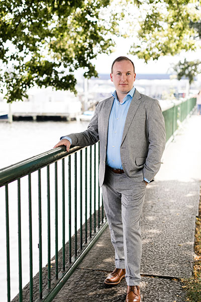 Groom by waterfront