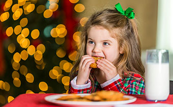 girl with milk and cookies